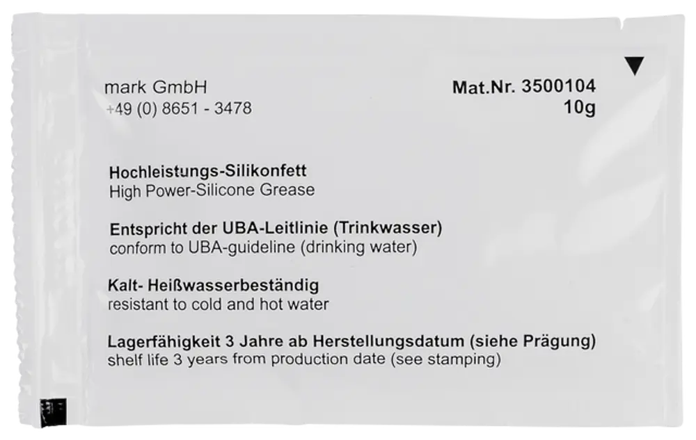 Verpackung mit Silikonfett von der Marke Wolf. Hinweise zur Verwendung, Lagerfähigkeit und Konformität mit UBA-Richtlinien sind auf dem Beutel angegeben.